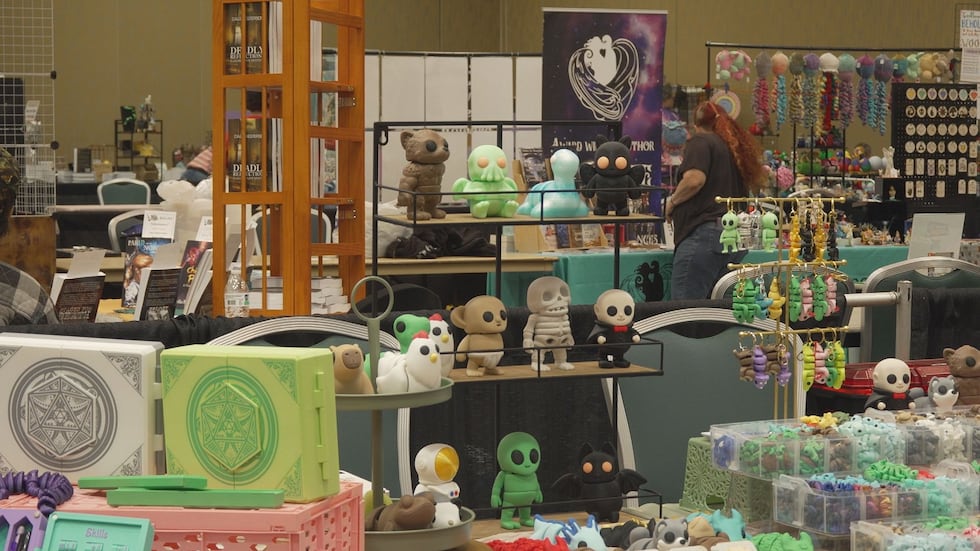 The event runs Friday through Sunday and features gaming, a merchant room, and a costume contest.