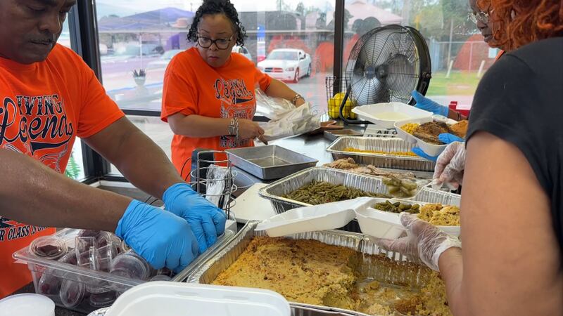 At Good Brothers Seafood on Main Street, an assembly line puts together meal after meal to...
