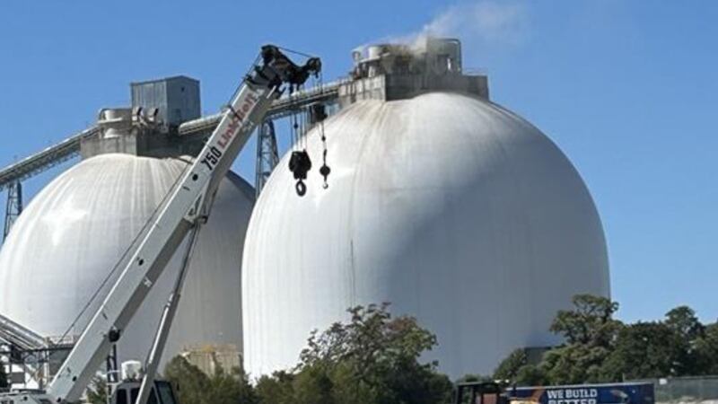 The fire started Monday afternoon inside one of the two Enviva domes at the port.