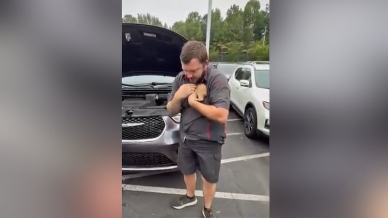 Technicians jacked the vehicle up to get a better angle for the rescue, and after several...