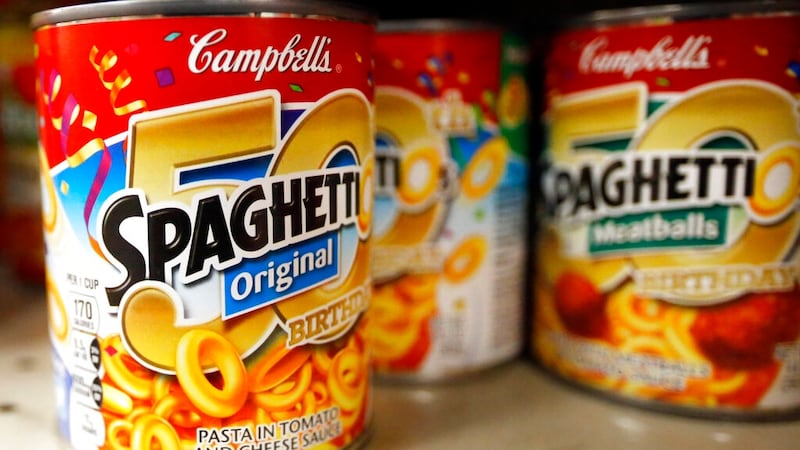 Cans of SpaghettiOs are set on the rack for sale at a store on Friday, Nov. 13, 2015, in...