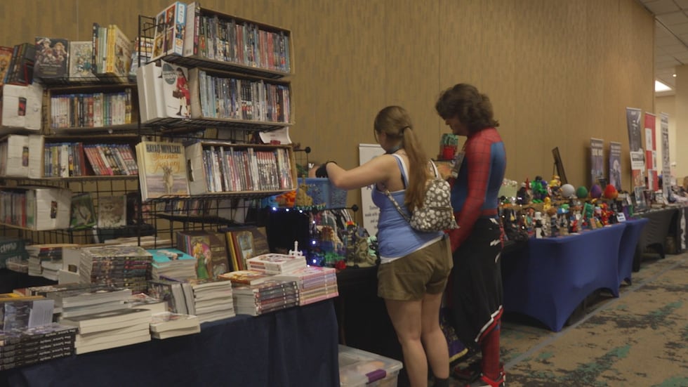 The event runs Friday through Sunday and features gaming, a merchant room, and a costume contest.