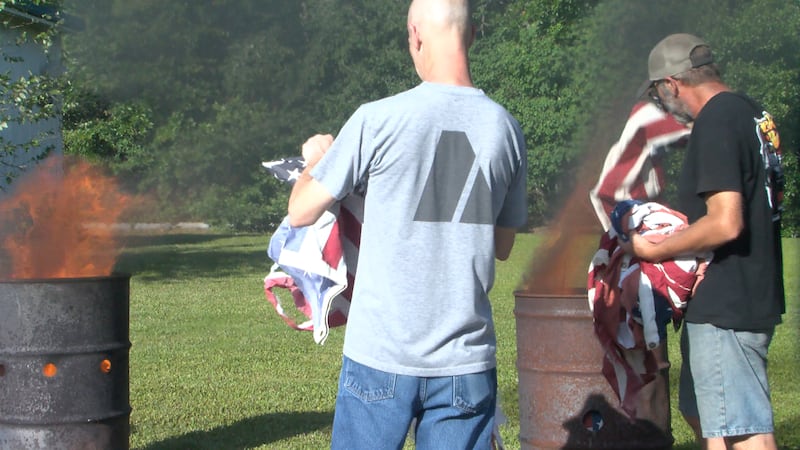 As members placed dozens of flags into the fire, Chaplain David Yeager said retirement by...