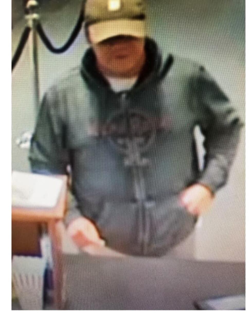 The suspect entered Navigator Credit Union in Gautier just after the business opened Saturday...