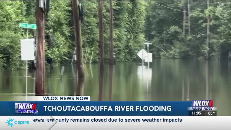 The Tchoutacabouffa River has overflowed its banks, spilling into nearby neighborhoods.